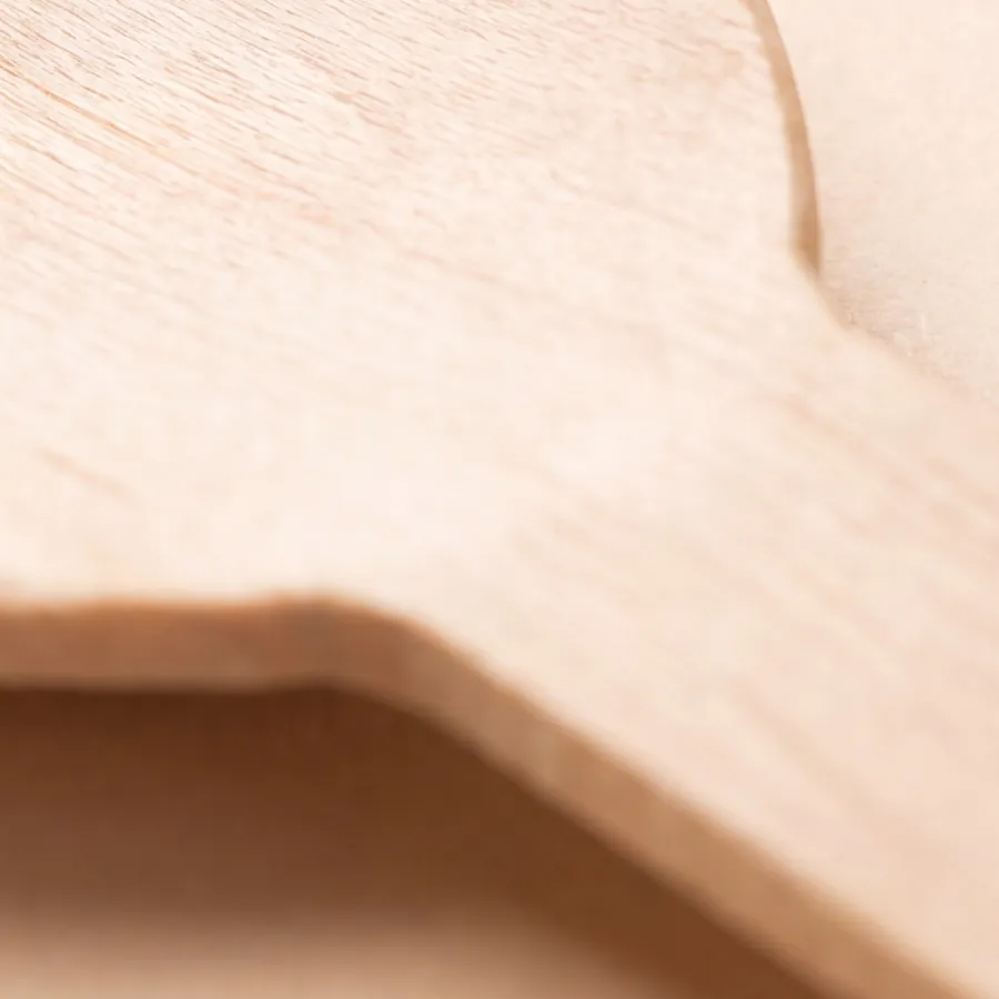 Wood grain where a wooden spoon meets its handle